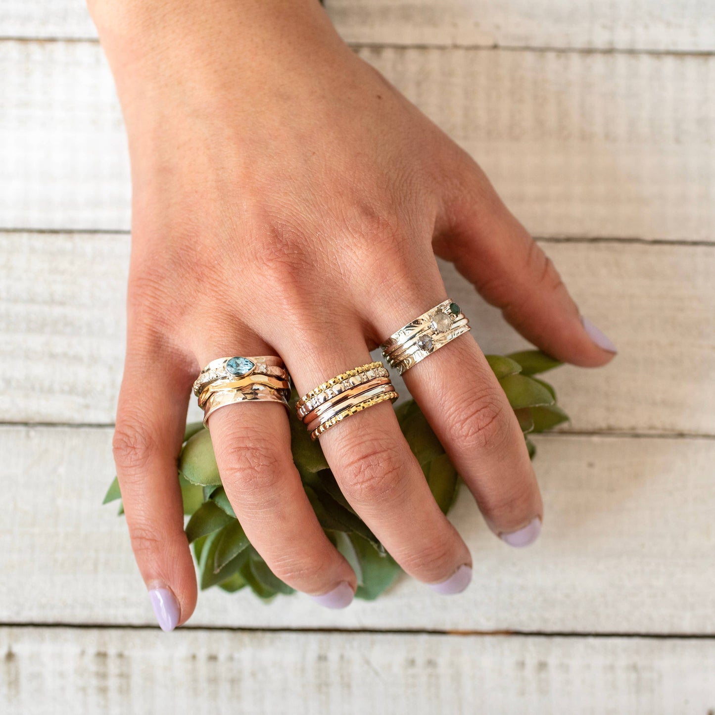 Sterling Silver Wave Spinner Ring w Blue Topaz