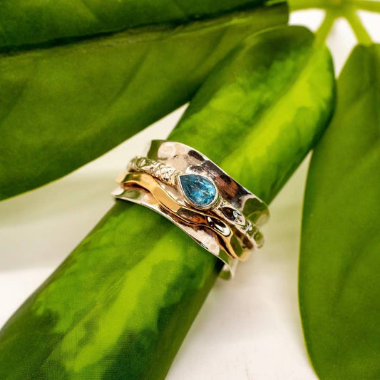 Sterling Silver Wave Spinner Ring w Blue Topaz
